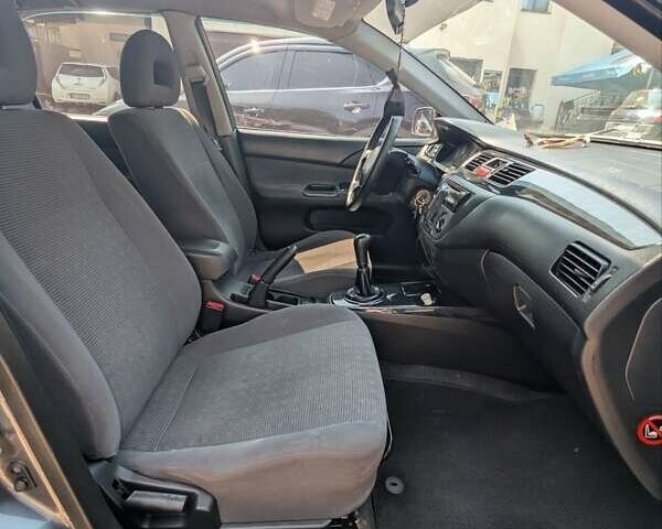 Сірий Міцубісі Lancer, об'ємом двигуна 1.58 л та пробігом 384 тис. км за 2500 $, фото 17 на Automoto.ua