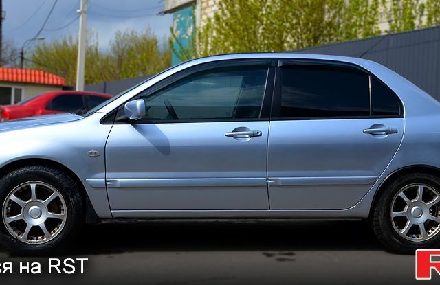 Мицубиси Лансер 2005 в Днепре (Днепропетровске) на Automoto.ua Серый Мицубиси Лансер, объемом двигателя 1.6 л и пробегом 300 тыс. км за 3599 $, фото 1 на Automoto.ua