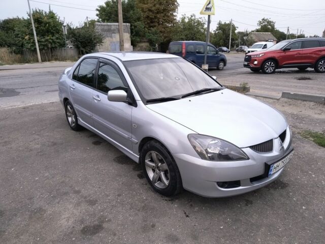 Серый Мицубиси Лансер, объемом двигателя 2 л и пробегом 212 тыс. км за 4300 $, фото 1 на Automoto.ua