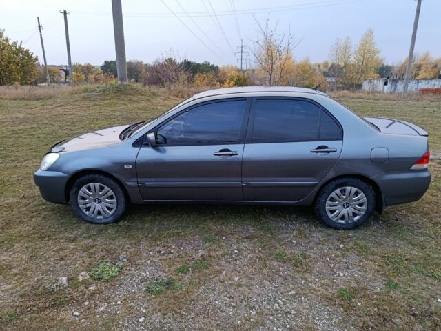Міцубісі Lancer 2005 у Кам'янське (Дніпродзержинськ) на Automoto.ua Сірий Міцубісі Lancer, об'ємом двигуна 1.6 л та пробігом 220 тис. км за 4100 $, фото 3 на Automoto.ua