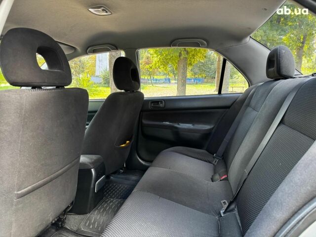 Мицубиси Лансер 2005 в Киеве на Automoto.ua Серый Мицубиси Лансер, объемом двигателя 1.6 л и пробегом 196 тыс. км за 4490 $, фото 21 на Automoto.ua