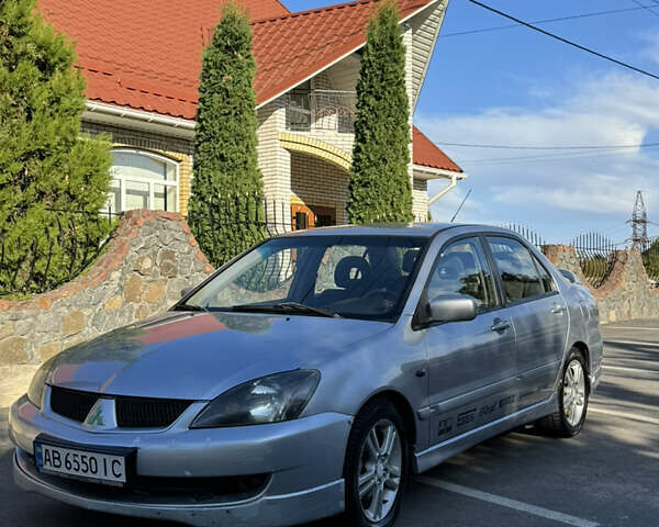 Сірий Міцубісі Lancer, об'ємом двигуна 2 л та пробігом 346 тис. км за 3200 $, фото 11 на Automoto.ua