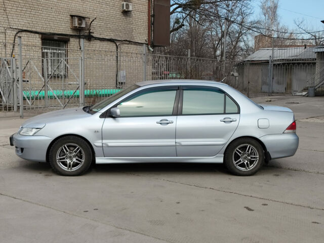 Сірий Міцубісі Lancer, об'ємом двигуна 1.6 л та пробігом 300 тис. км за 5290 $, фото 2 на Automoto.ua