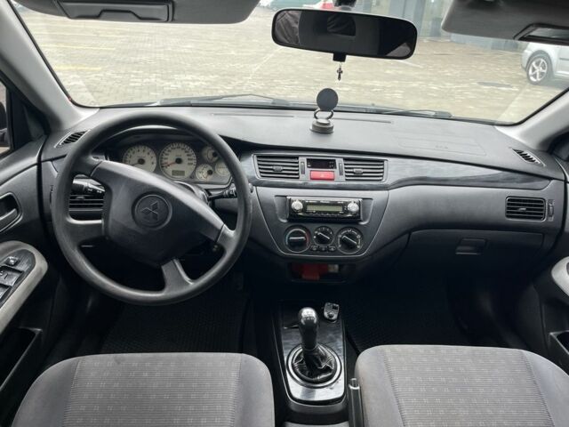 Сірий Міцубісі Lancer, об'ємом двигуна 1.6 л та пробігом 231 тис. км за 3500 $, фото 6 на Automoto.ua
