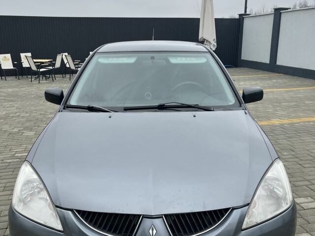 Сірий Міцубісі Lancer, об'ємом двигуна 1.6 л та пробігом 231 тис. км за 3500 $, фото 1 на Automoto.ua