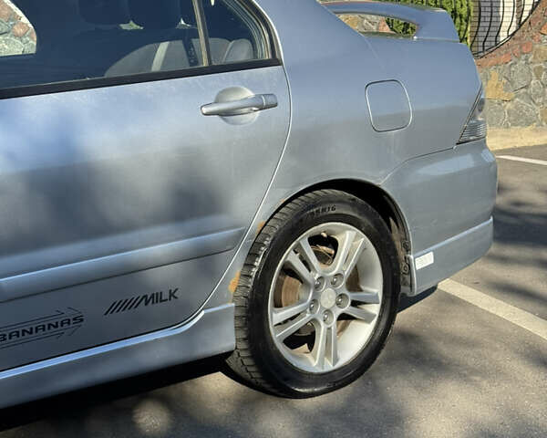 Сірий Міцубісі Lancer, об'ємом двигуна 2 л та пробігом 346 тис. км за 3200 $, фото 7 на Automoto.ua