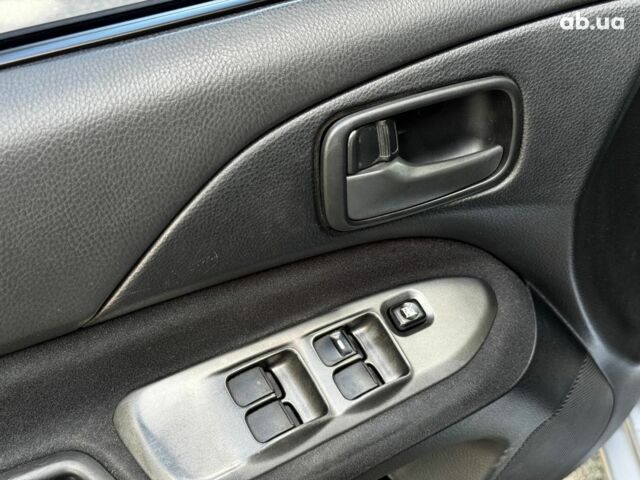 Мицубиси Лансер 2005 в Киеве на Automoto.ua Серый Мицубиси Лансер, объемом двигателя 1.6 л и пробегом 196 тыс. км за 4490 $, фото 12 на Automoto.ua