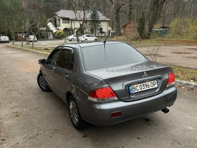 Сірий Міцубісі Lancer, об'ємом двигуна 1.6 л та пробігом 230 тис. км за 2799 $, фото 13 на Automoto.ua