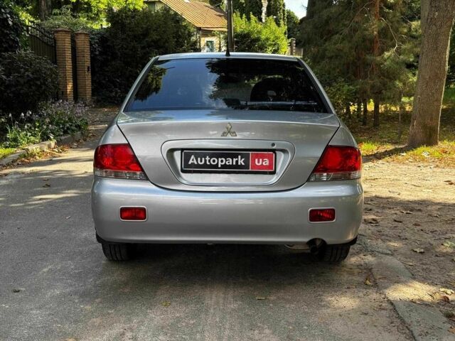 Серый Мицубиси Лансер, объемом двигателя 1.6 л и пробегом 196 тыс. км за 4390 $, фото 7 на Automoto.ua