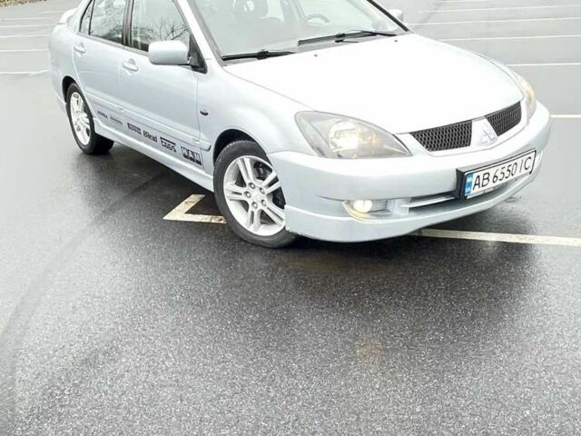 Сірий Міцубісі Lancer, об'ємом двигуна 2 л та пробігом 1 тис. км за 3500 $, фото 1 на Automoto.ua