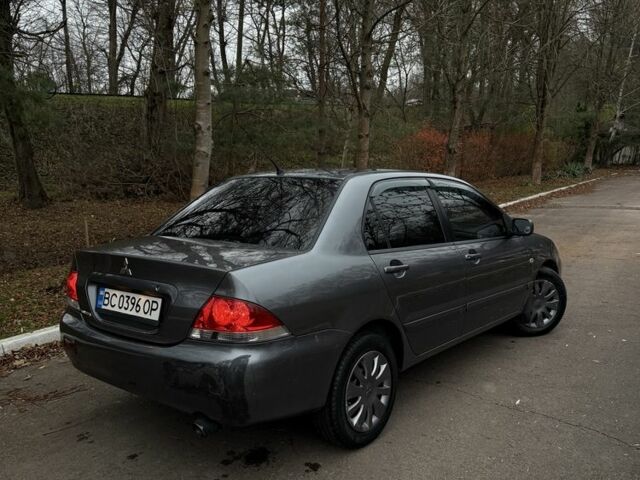 Сірий Міцубісі Lancer, об'ємом двигуна 1.6 л та пробігом 230 тис. км за 2799 $, фото 15 на Automoto.ua