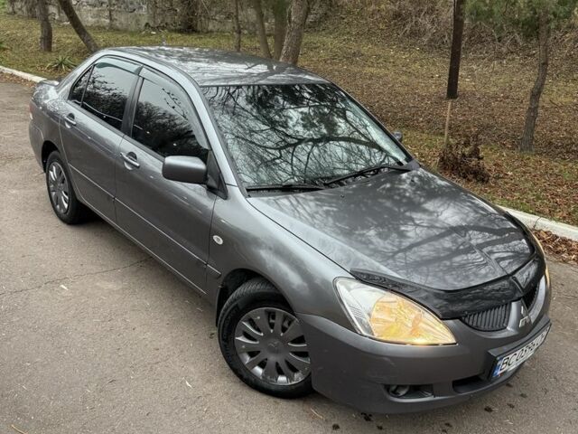 Сірий Міцубісі Lancer, об'ємом двигуна 1.6 л та пробігом 230 тис. км за 2799 $, фото 10 на Automoto.ua