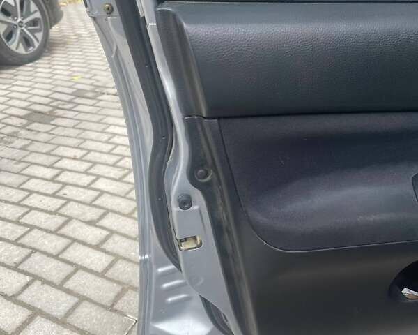 Сірий Міцубісі Lancer, об'ємом двигуна 1.58 л та пробігом 315 тис. км за 2350 $, фото 4 на Automoto.ua