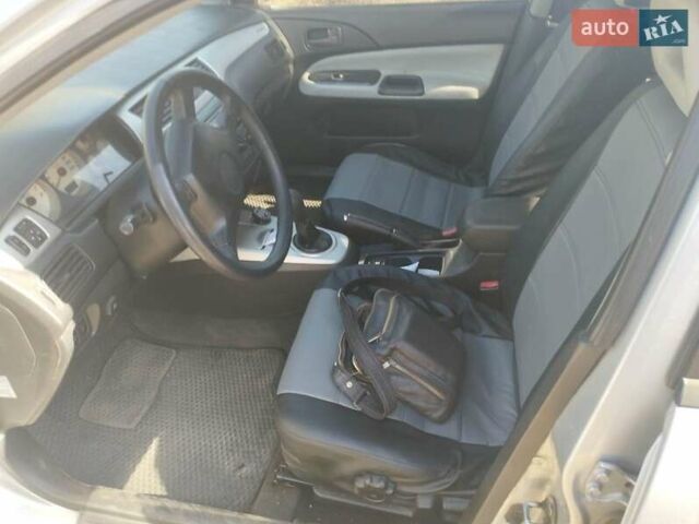 Сірий Міцубісі Lancer, об'ємом двигуна 1.6 л та пробігом 244 тис. км за 3300 $, фото 6 на Automoto.ua