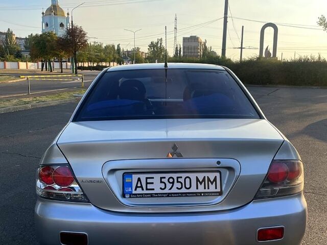 Сірий Міцубісі Lancer, об'ємом двигуна 1.6 л та пробігом 282 тис. км за 4100 $, фото 4 на Automoto.ua