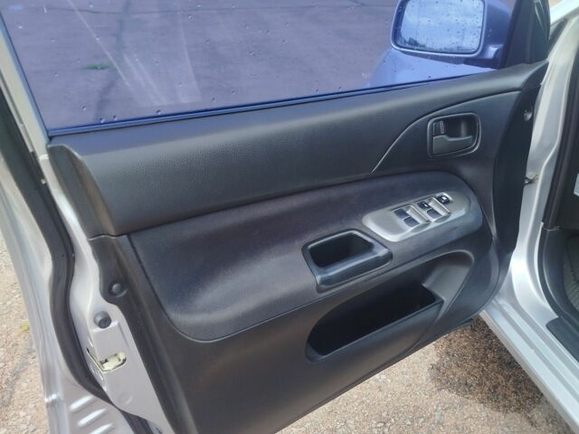 Серый Мицубиси Лансер, объемом двигателя 1.6 л и пробегом 250 тыс. км за 3600 $, фото 20 на Automoto.ua