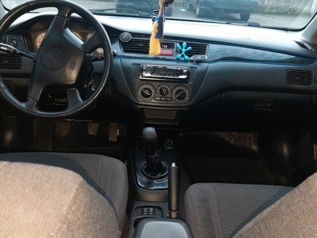 Сірий Міцубісі Lancer, об'ємом двигуна 1.6 л та пробігом 27 тис. км за 4200 $, фото 5 на Automoto.ua