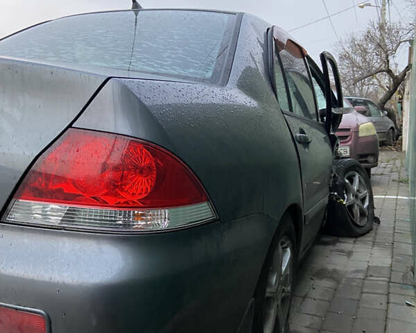 Сірий Міцубісі Lancer, об'ємом двигуна 1.58 л та пробігом 230 тис. км за 1400 $, фото 10 на Automoto.ua