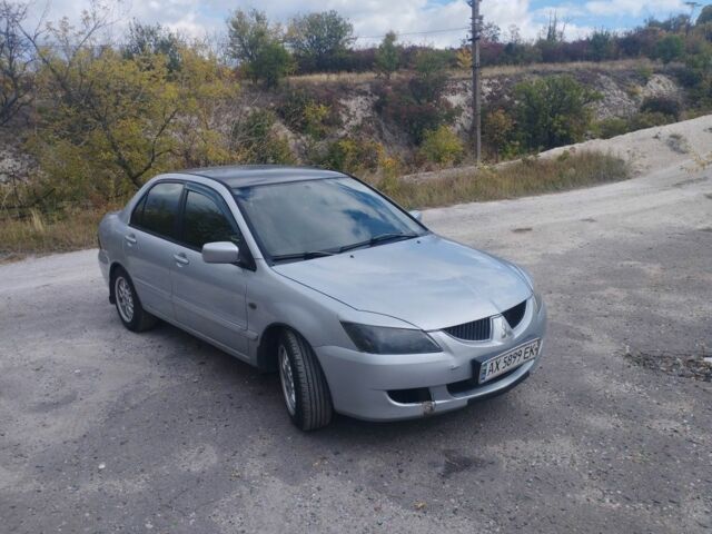 Сірий Міцубісі Lancer, об'ємом двигуна 1.6 л та пробігом 244 тис. км за 3300 $, фото 2 на Automoto.ua