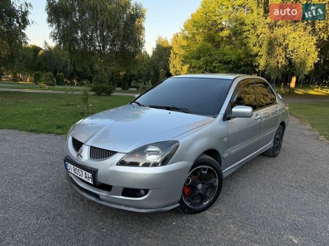Сірий Міцубісі Lancer, об'ємом двигуна 2 л та пробігом 360 тис. км за 3400 $, фото 1 на Automoto.ua