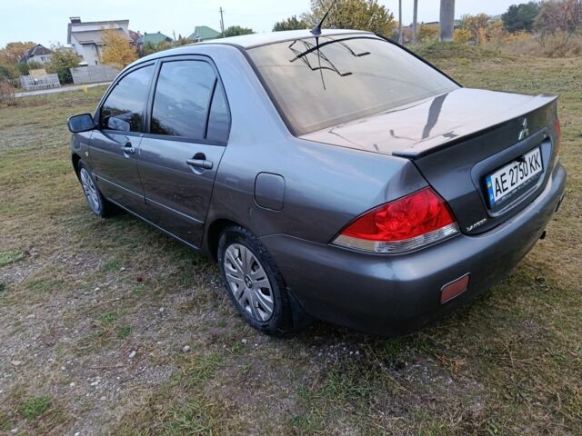 Міцубісі Lancer 2005 у Кам'янське (Дніпродзержинськ) на Automoto.ua Сірий Міцубісі Lancer, об'ємом двигуна 1.6 л та пробігом 220 тис. км за 4100 $, фото 5 на Automoto.ua