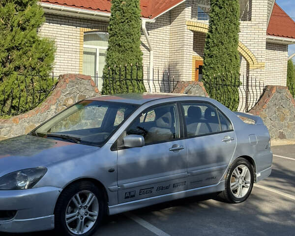 Сірий Міцубісі Lancer, об'ємом двигуна 2 л та пробігом 346 тис. км за 3200 $, фото 3 на Automoto.ua
