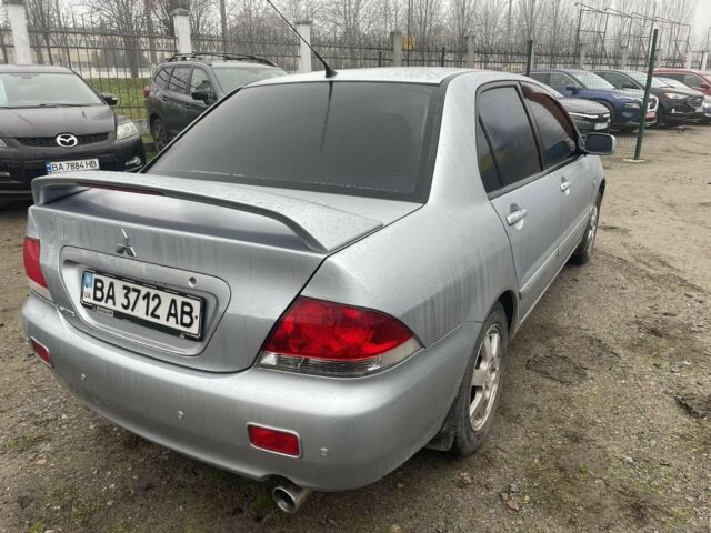 Серый Мицубиси Лансер, объемом двигателя 1.6 л и пробегом 200 тыс. км за 3906 $, фото 4 на Automoto.ua