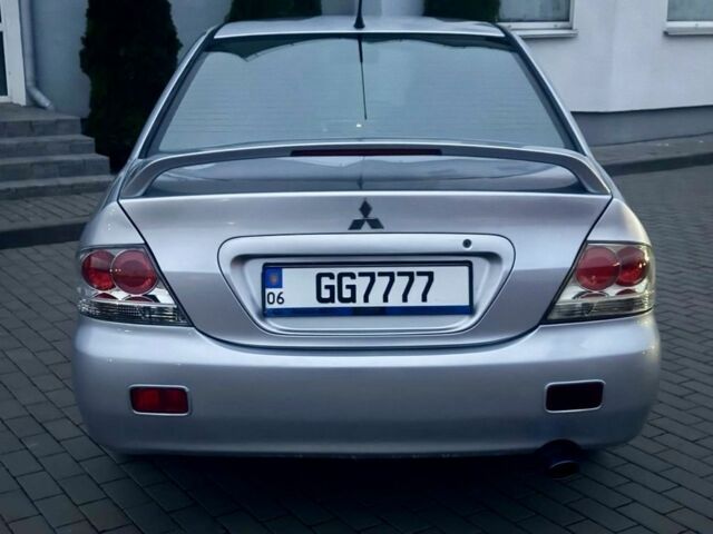 Сірий Міцубісі Lancer, об'ємом двигуна 2 л та пробігом 187 тис. км за 4497 $, фото 4 на Automoto.ua
