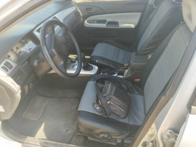 Сірий Міцубісі Lancer, об'ємом двигуна 1.6 л та пробігом 244 тис. км за 3300 $, фото 7 на Automoto.ua