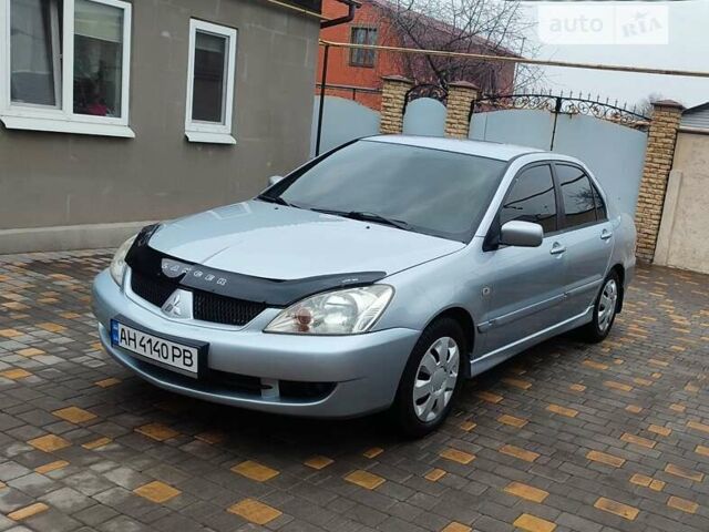 Сірий Міцубісі Lancer, об'ємом двигуна 1.6 л та пробігом 199 тис. км за 4950 $, фото 2 на Automoto.ua