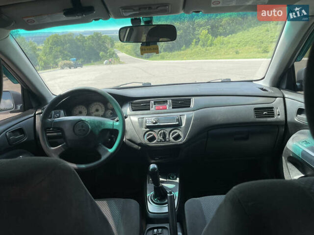 Мицубиси Лансер 2005 в Харькове на Automoto.ua Серый Мицубиси Лансер, объемом двигателя 1.58 л и пробегом 240 тыс. км за 4500 $, фото 6 на Automoto.ua