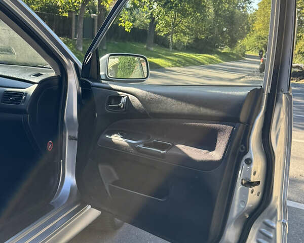 Сірий Міцубісі Lancer, об'ємом двигуна 2 л та пробігом 346 тис. км за 3200 $, фото 8 на Automoto.ua