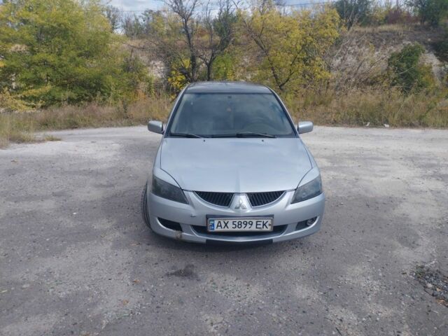 Сірий Міцубісі Lancer, об'ємом двигуна 1.6 л та пробігом 244 тис. км за 3300 $, фото 1 на Automoto.ua