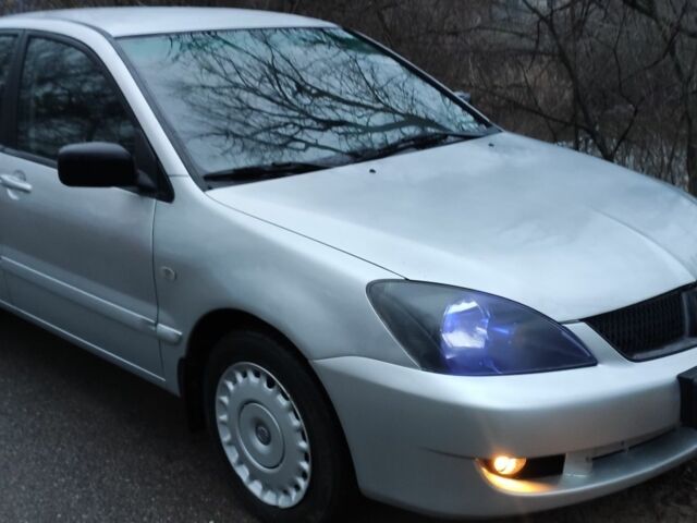 Серый Мицубиси Лансер, объемом двигателя 1.6 л и пробегом 235 тыс. км за 2850 $, фото 3 на Automoto.ua