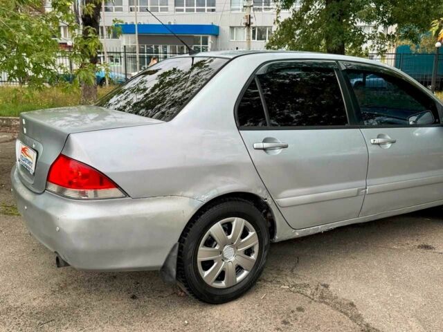 Мицубиси Лансер 2005 в Киеве на Automoto.ua Серый Мицубиси Лансер, объемом двигателя 1.58 л и пробегом 180 тыс. км за 2490 $, фото 8 на Automoto.ua