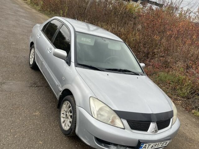 Міцубісі Lancer 2005 у Чернівцях на Automoto.ua Сірий Міцубісі Lancer, об'ємом двигуна 1.6 л та пробігом 319 тис. км за 2450 $, фото 2 на Automoto.ua
