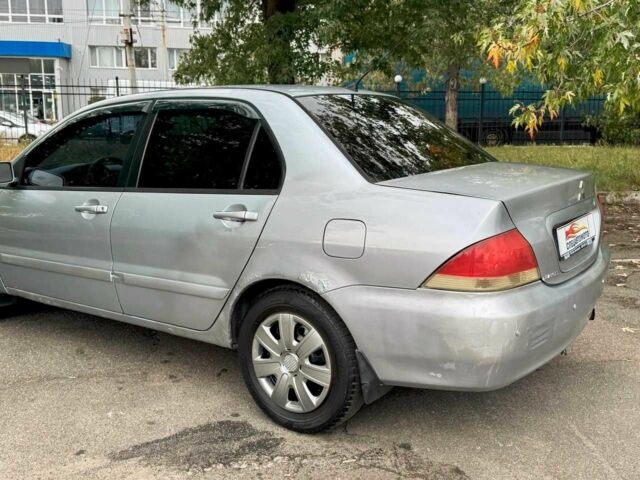 Мицубиси Лансер 2005 в Киеве на Automoto.ua Серый Мицубиси Лансер, объемом двигателя 1.58 л и пробегом 180 тыс. км за 2490 $, фото 7 на Automoto.ua