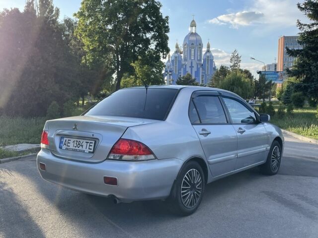 Сірий Міцубісі Lancer, об'ємом двигуна 1.6 л та пробігом 291 тис. км за 3900 $, фото 3 на Automoto.ua