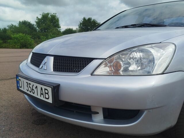 Серый Мицубиси Лансер, объемом двигателя 1.6 л и пробегом 250 тыс. км за 3600 $, фото 12 на Automoto.ua