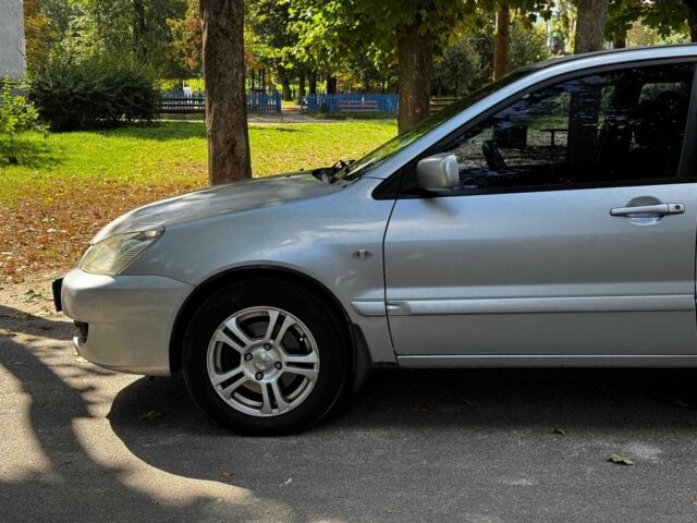 Серый Мицубиси Лансер, объемом двигателя 1.6 л и пробегом 196 тыс. км за 4390 $, фото 10 на Automoto.ua