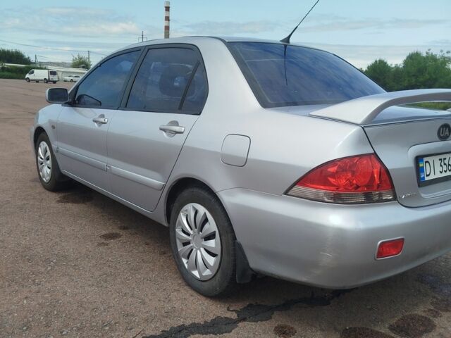 Серый Мицубиси Лансер, объемом двигателя 1.6 л и пробегом 250 тыс. км за 3600 $, фото 19 на Automoto.ua