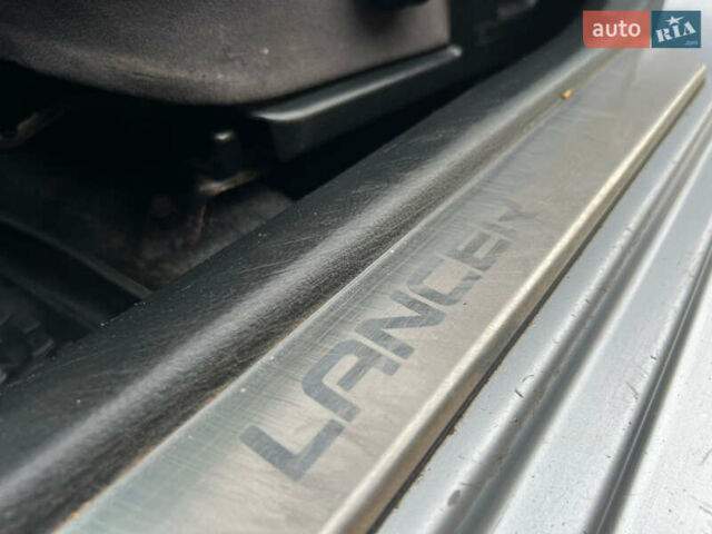 Сірий Міцубісі Lancer, об'ємом двигуна 1.6 л та пробігом 310 тис. км за 3350 $, фото 30 на Automoto.ua