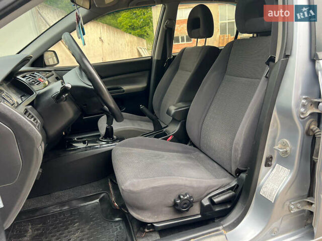 Сірий Міцубісі Lancer, об'ємом двигуна 1.6 л та пробігом 310 тис. км за 3350 $, фото 25 на Automoto.ua