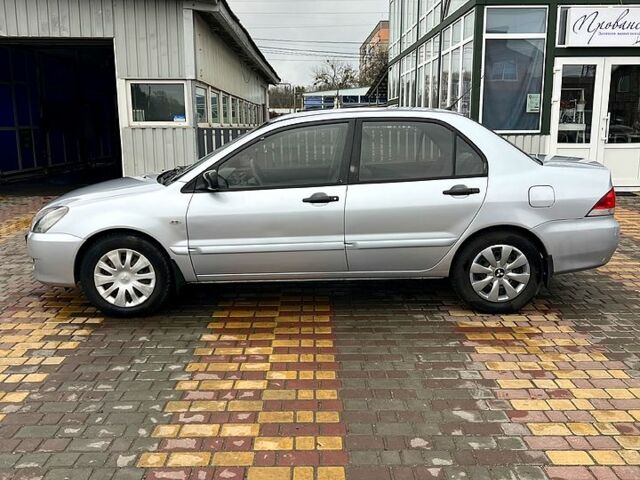 Сірий Міцубісі Lancer, об'ємом двигуна 1.6 л та пробігом 236 тис. км за 3800 $, фото 4 на Automoto.ua
