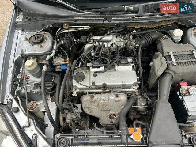 Сірий Міцубісі Lancer, об'ємом двигуна 1.6 л та пробігом 310 тис. км за 3350 $, фото 34 на Automoto.ua