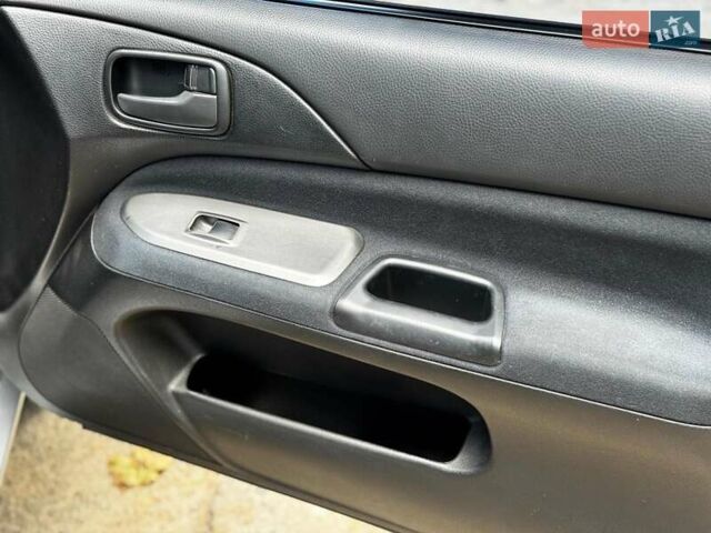 Серый Мицубиси Лансер, объемом двигателя 1.6 л и пробегом 196 тыс. км за 4490 $, фото 27 на Automoto.ua