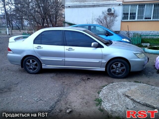 Сірий Міцубісі Lancer, об'ємом двигуна 1.6 л та пробігом 319 тис. км за 4250 $, фото 2 на Automoto.ua