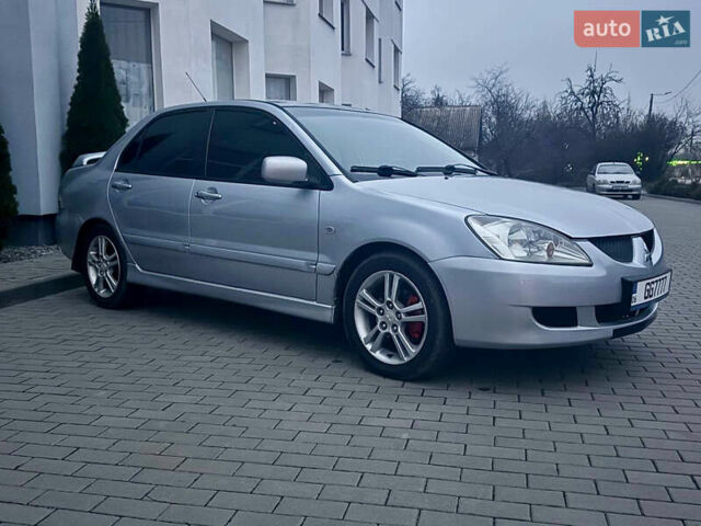 Сірий Міцубісі Lancer, об'ємом двигуна 2 л та пробігом 187 тис. км за 4600 $, фото 1 на Automoto.ua