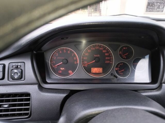 Серый Мицубиси Лансер, объемом двигателя 2 л и пробегом 212 тыс. км за 4300 $, фото 5 на Automoto.ua