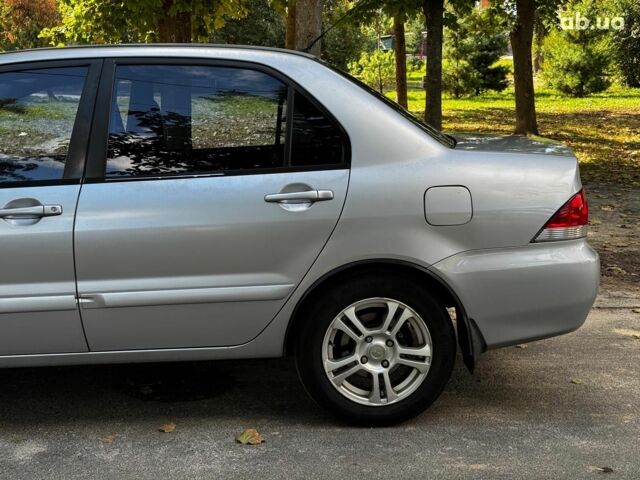 Мицубиси Лансер 2005 в Киеве на Automoto.ua Серый Мицубиси Лансер, объемом двигателя 1.6 л и пробегом 196 тыс. км за 4490 $, фото 9 на Automoto.ua